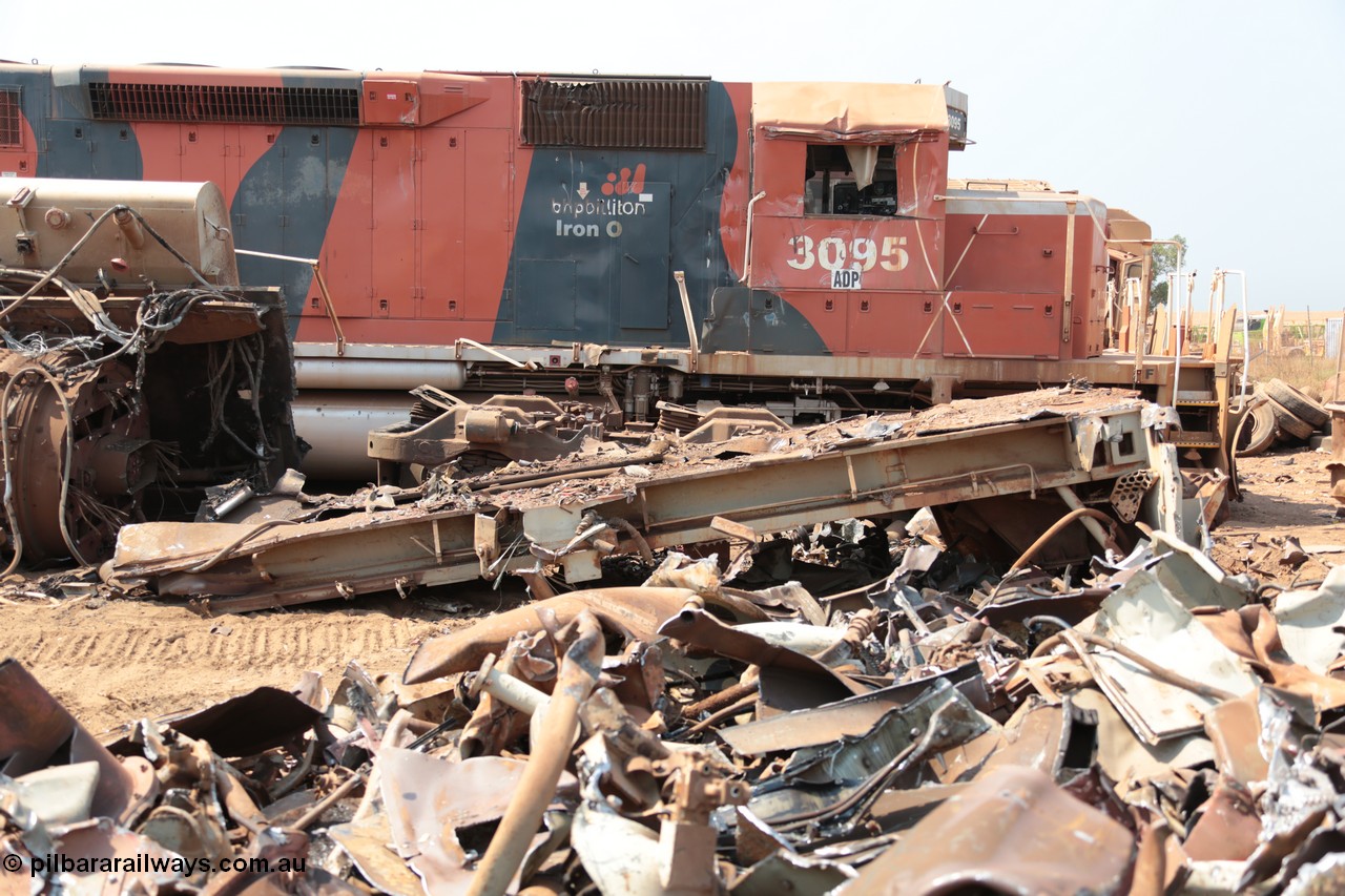 141027 5860
Wedgefield, Sell and Parker's metal recycling yard, view of EMD SD40R unit 3095 serial 33677/7083-7 watching a former sister unit being reduced to bits, fuel tank tipped on its side, pilot and bogie.
Keywords: 3095;EMD;SD40R;33677/7083-7;SD40;SP8485;