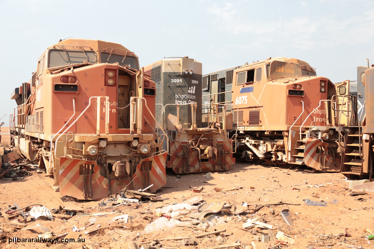 141027 5877
Wedgefield, Sell and Parker's metal recycling yard, General Electric AC6000 units 6073 serial 51065 and 6075 serial 51067 flank EMD SD40R unit 3091 serial 31496/7861-6 prior to scrapping.
Keywords: S+P;6073;GE;AC6000;51065;6075;51067;3091;EMD;SD40R;31496/7861-6;