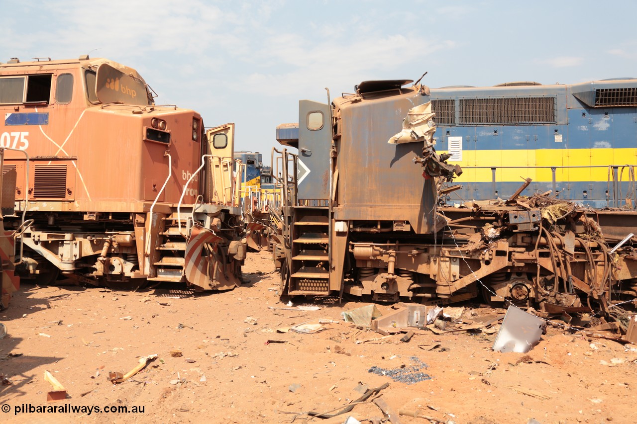 141027 5880
Wedgefield, Sell and Parker's metal recycling yard, General Electric AC6000 units 6075 serial 51067 is nose to nose with the remains of sister unit 6071 serial 51063.
Keywords: S+P;6075;GE;AC6000;51067;6071;51063;