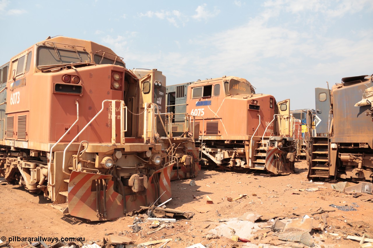 141027 5883
Wedgefield, Sell and Parker's metal recycling yard, General Electric AC6000 units 6073 serial 51065 and 6075 serial 51067 flank EMD SD40R unit 3091 serial 31496/7861-6 prior to scrapping.
Keywords: S+P;6073;GE;AC6000;51065;6075;51067;3091;EMD;SD40R;31496/7861-6;