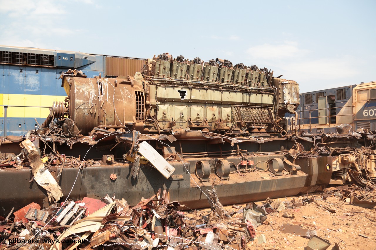 141027 5884
Wedgefield, Sell and Parker's metal recycling yard, General Electric AC6000 unit 6071 serial 51063 6600 hp GEVO-16 motor and GE 5GMG201 alternator awaiting the thermal lance.
Keywords: 6071;GE;AC6000;51063;