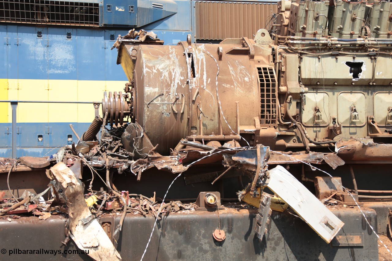 141027 5885
Wedgefield, Sell and Parker's metal recycling yard, General Electric AC6000 unit 6071 serial 51063 6600 hp GE 5GMG201 alternator.
Keywords: 6071;GE;AC6000;51063;