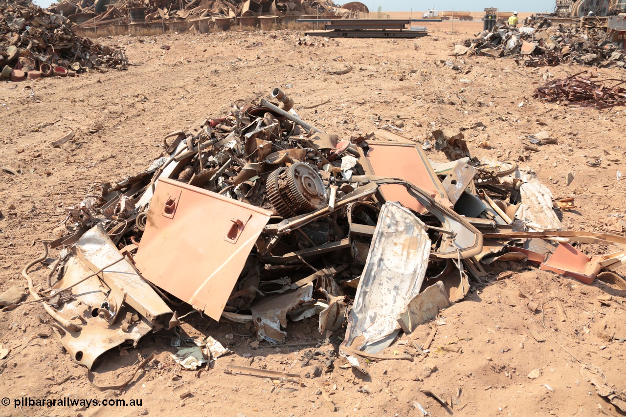 141027 5896
Wedgefield, Sell and Parker's metal recycling yard, a pile of bits from GE AC6000 unit 6071.
