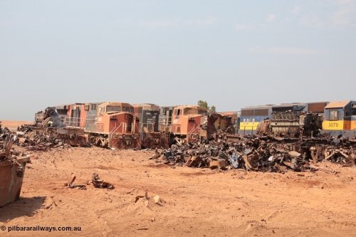 141027 5825
Wedgefield, view out the back of Sell and Parker's metal recycling yard shows a sorry sight. From left is the frame of an SD40R and prime mover, AC6000 6073, SD40R 3091, AC6000 6075 and SD40 3079. Beside 3079 is the remains of AC6000 unit 6071 having been reduced from one of the most powerful locomotives to work in Australia to a munched up tangled mass of metal, the EVO motor is still in the frame.
Keywords: S+P;6073;6075;3079;GE;AC6000;EMD;SD40R;51065;51067;31542/7861-52;