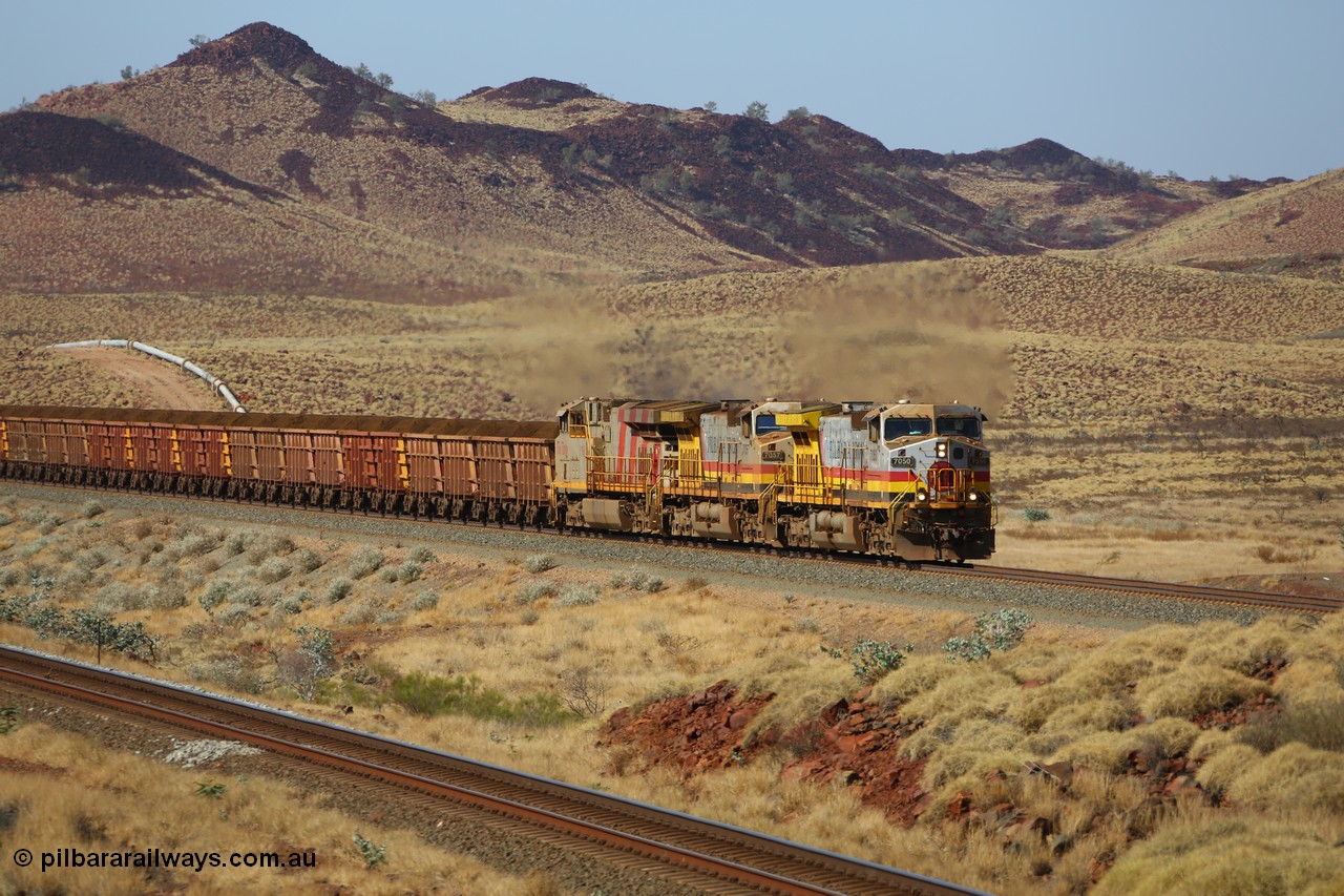 151111 9500
At the 47 km post on the Cape Lambert line a loaded train runs along on the West Mainline behind 7050 and 7057 both General Electric Dash 9-44CW units with serials of 57101 and 55882 and the last General Electric ES44DCi 8199, serial 61858.
Keywords: 7050;GE;Dash-9-44CW;57101;