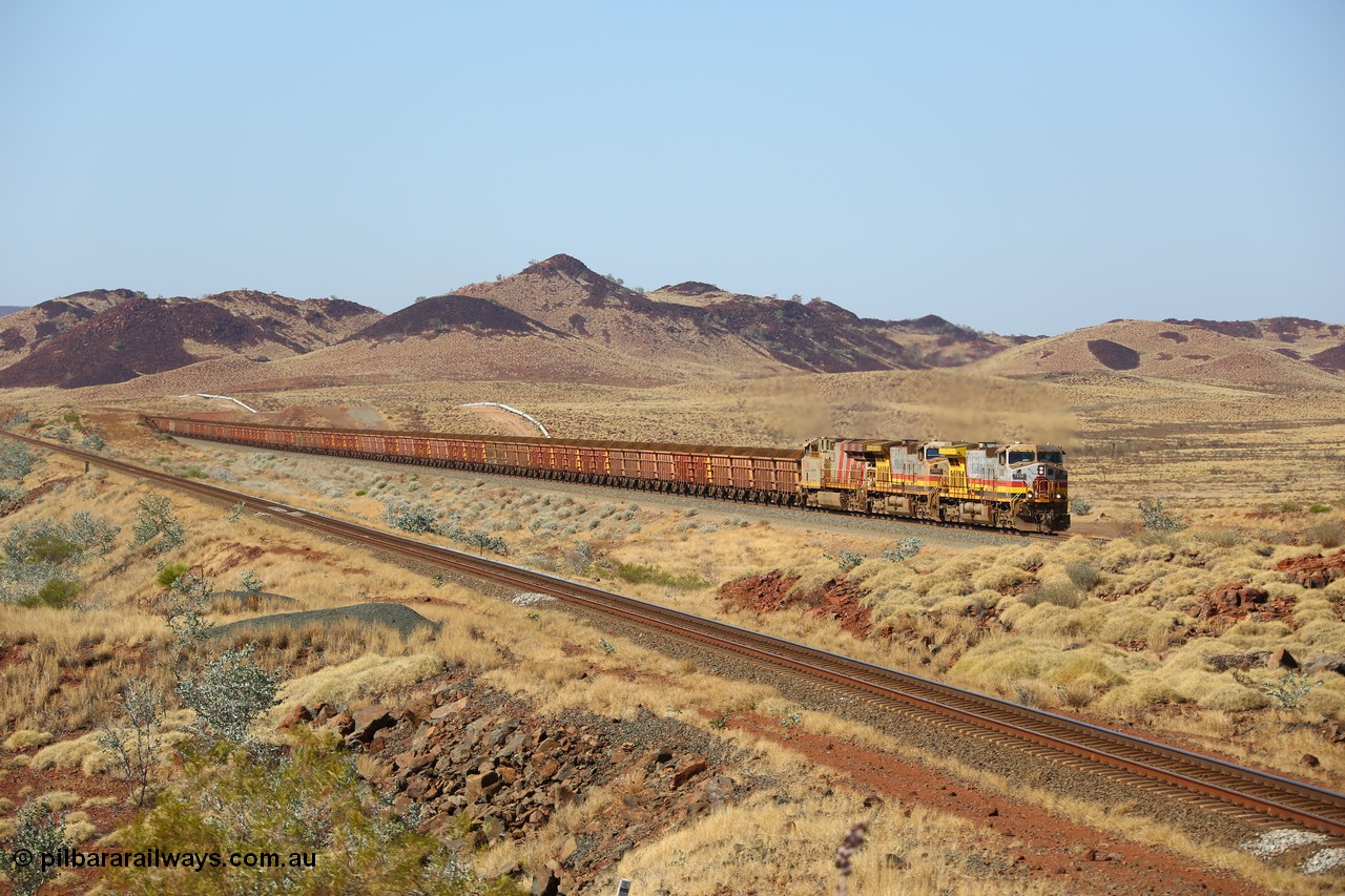 151111 9501
At the 47 km post on the Cape Lambert line a loaded train runs along on the West Mainline behind 7050 and 7057 both General Electric Dash 9-44CW units with serials of 57101 and 55882 and the last General Electric ES44DCi 8199, serial 61858.
Keywords: 7050;GE;Dash-9-44CW;57101;