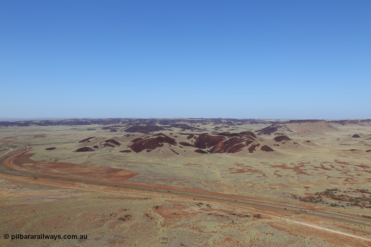 151111 9506
A view from Table Hill looking south west across the Robe River rail line and the rolling hills and mesas.
