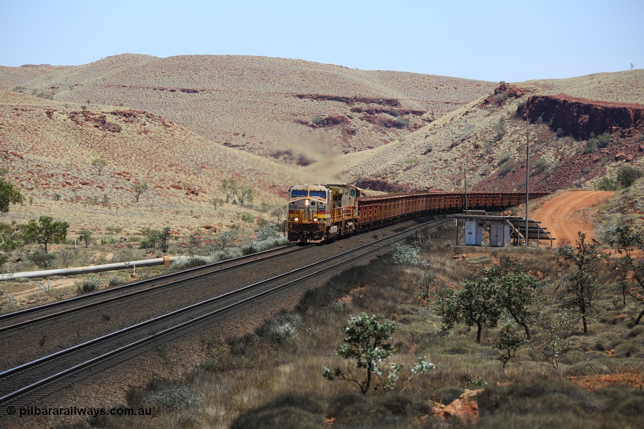 151111 9563
An empty train struggles upgrade at the 84 km post on the Tom Price line behind double General Electric Dash 9-44CW units 9403 serial 53457 wearing ROBE Pilbara Rail livery and 7087 serial 47766 wearing the original Hamersley Iron livery.
Keywords: 9403;GE;Dash-9-44CW;53457;