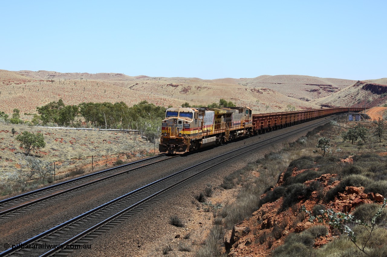 151111 9568
An empty train struggles upgrade at the 87.5 km post on the Tom Price line behind double General Electric Dash 9-44CW units 9403 serial 53457 wearing ROBE Pilbara Rail livery and 7087 serial 47766 wearing the original Hamersley Iron livery.
Keywords: 9403;GE;Dash-9-44CW;53457;
