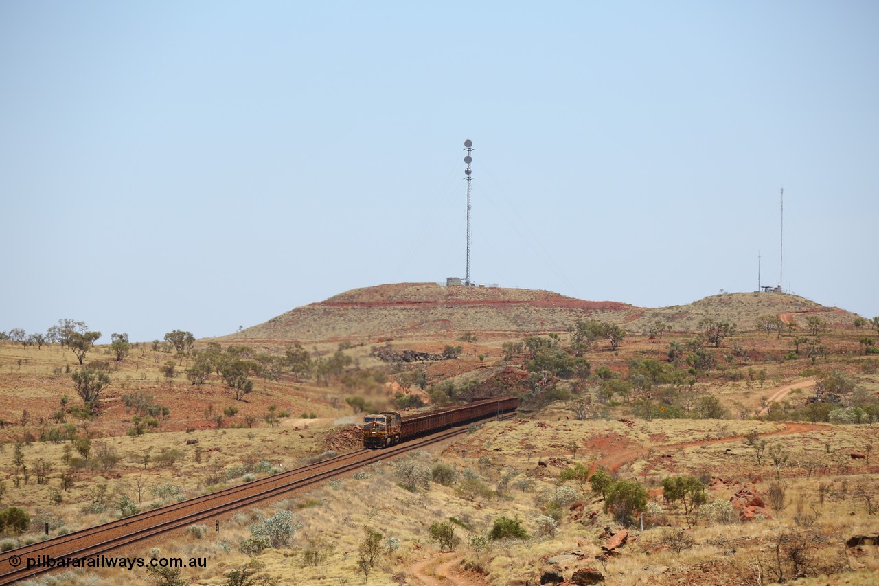 151111 9573
An empty train is still struggling upgrade at the 98 km post on the Tom Price line behind double General Electric Dash 9-44CW units 9403 serial 53457 wearing ROBE Pilbara Rail livery and 7087 serial 47766 wearing the original Hamersley Iron livery.
Keywords: 9403;GE;Dash-9-44CW;53457;