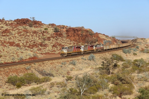 151111 9491
Near the 38 km post, an empty train lead by General Electric ES44DCi units 8160 and 8193 serials 60224 and 61852 and General Electric Dash 9-44CW 7074 serial 47743 power under the water supply pipeline on the Cape Lambert line.
Keywords: 8160;GE;ES44DCi;60224;