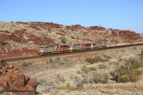 151111 9495
Near the 38 km post, an empty train lead by General Electric ES44DCi units 8160 and 8193 serials 60224 and 61852 and General Electric Dash 9-44CW 7074 serial 47743 power under the water supply pipeline on the Cape Lambert line.
Keywords: 8160;GE;ES44DCi;60224;
