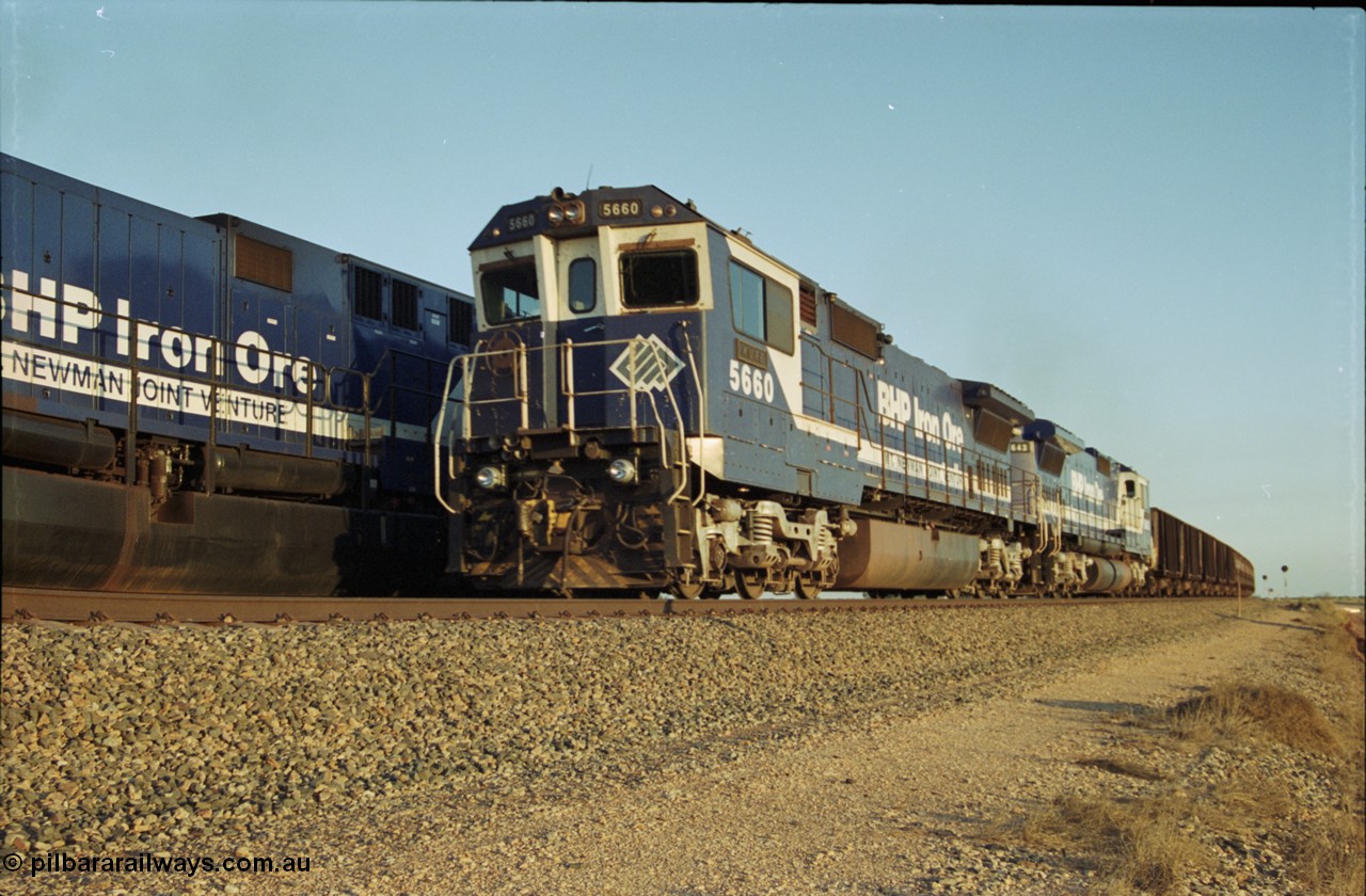 203-14
Bing Siding, a loaded BHP Iron Ore train with double Dash 8 power behind Goninan GE rebuild CM40-8M models 5660 'Kure' serial 8412-05 / 94-151 and sister 5643 'Mt Whaleback' serial no 8281-08 / 92-132 as they cross an empty train in the siding with an AC6000 unit.
Keywords: 5660;Goninan;GE;CM40-8M;8412-05/94-151;rebuild;AE-Goodwin;ALCo;M636C;5478;G6047-10;