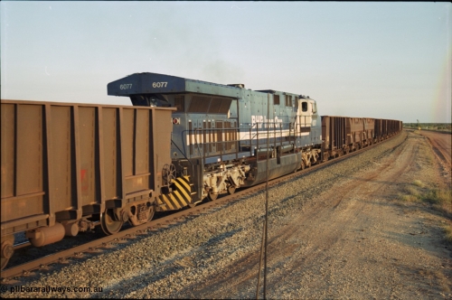 203-25
Bing Siding, min-train unit on an empty Yandi working BHP General Electric built AC6000 6077 'Nimingarra' serial 51069.
Keywords: 6077;GE;AC6000CW;51069;