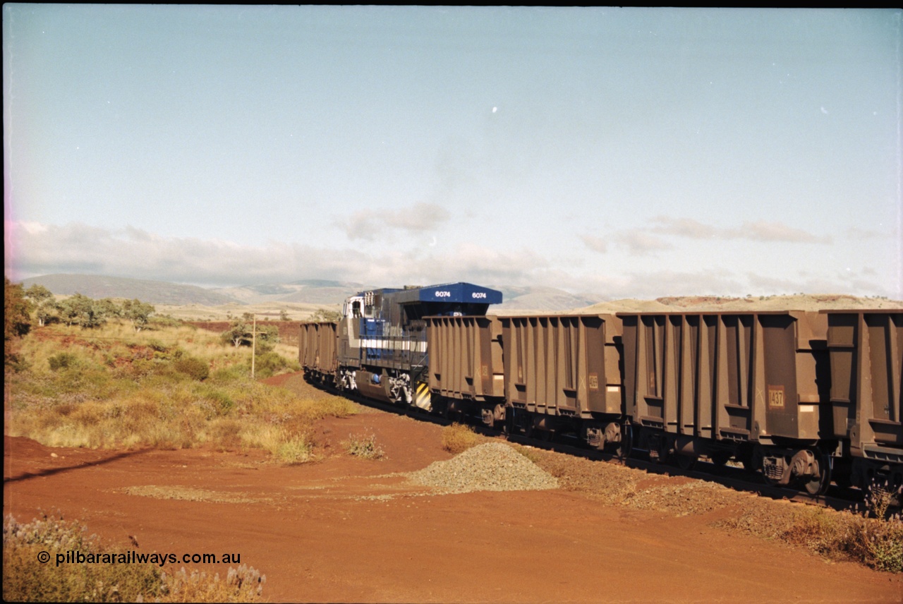 207-04
BHP General Electric built AC6000 unit 6074 serial 51066, brand new and unnamed at Yandi One load-out loop as a remote mid-train unit.
Keywords: 6074;GE;AC6000;51066;