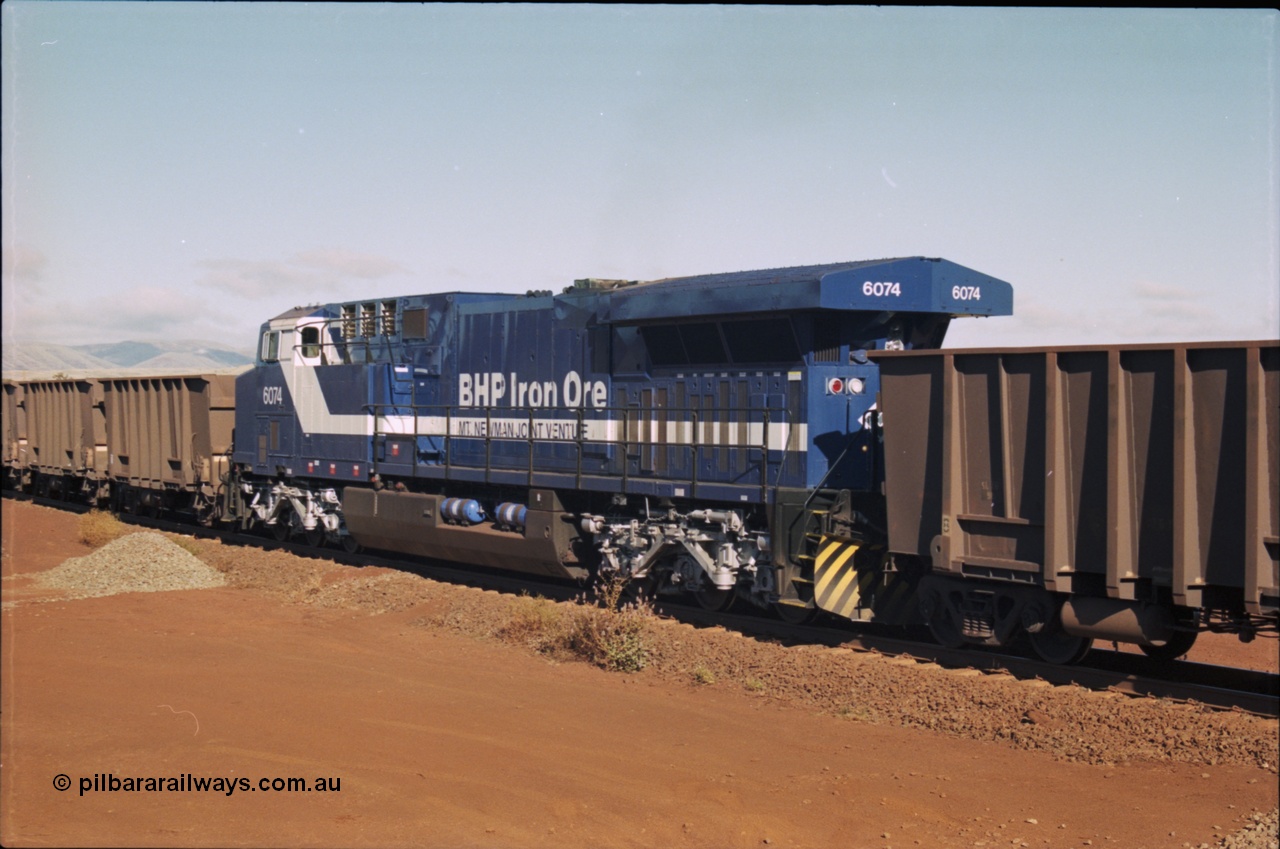 207-08
BHP General Electric built AC6000 unit 6074 serial 51066, brand new and unnamed at Yandi One load-out loop as a remote mid-train unit.
Keywords: 6074;GE;AC6000;51066;railpage:class=250;railpage:loco=6074;rp-au-bhp-ac6000;rp-au-bhp-ac6000-6074;