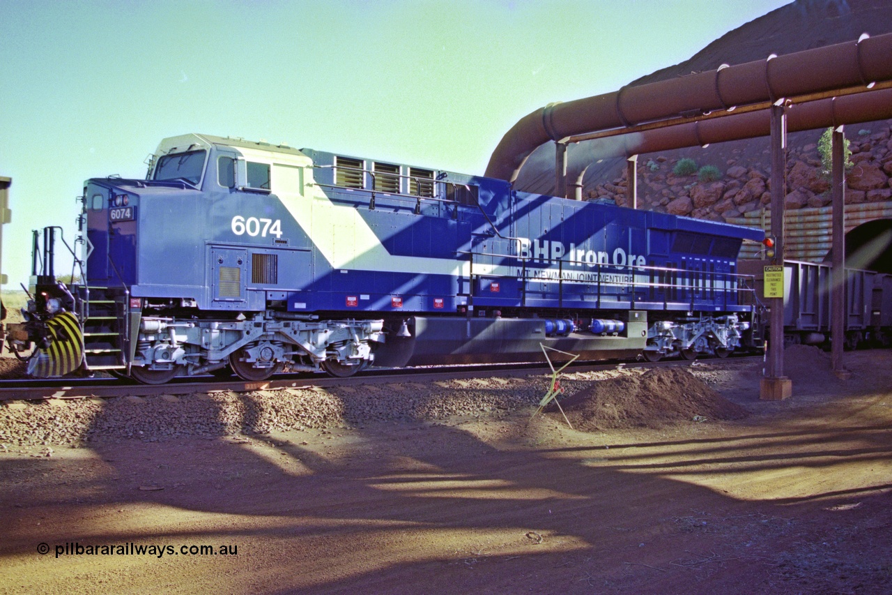 207-16
BHP General Electric built AC6000 unit 6074 serial 51066, brand new and unnamed at Yandi One load-out tunnel as a remote mid-train unit.
Keywords: 6074;GE;AC6000;51066;railpage:class=250;railpage:loco=6074;rp-au-bhp-ac6000;rp-au-bhp-ac6000-6074;