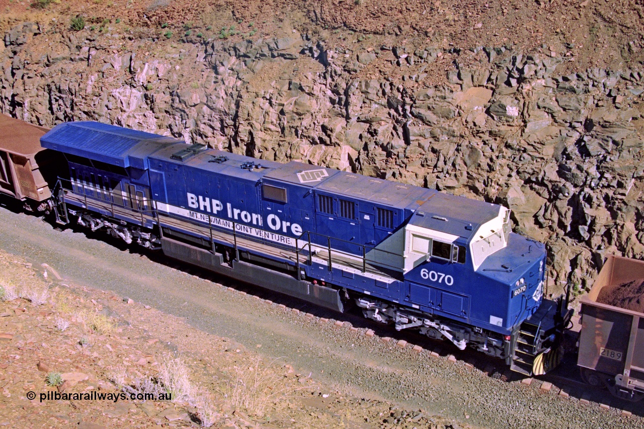 207-20
BHP General Electric built AC6000 unit 6071 serial 51063 brand new and unnamed on the loaded side of Yandi One load-out loop as a remote mid-train unit, showing roof view and the original style windscreen protectors.
Keywords: 6074;GE;AC6000;51066;