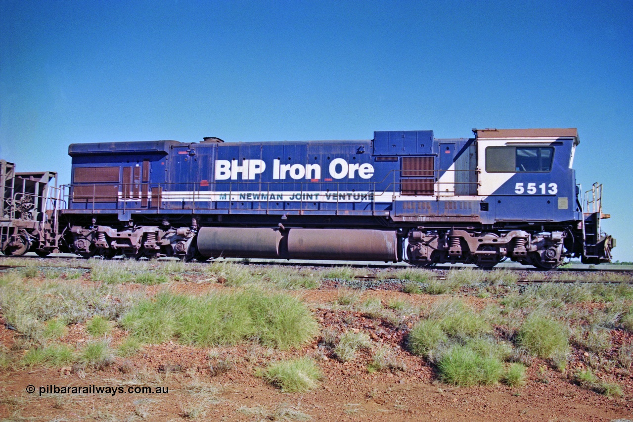 207-24
Hardie Siding, BHP locomotive 5513 is the final member of Goninan rebuilds from ALCo C636 5453 into a GE C36-7M unit 5513 serial 4839-02 / 88-078, with 'Kalgan' nameboards removed for fitting to AC6000 class 6074, holds the main with a loaded Yarrie train awaiting a cross.
Keywords: 5513;Goninan;GE;C36-7M;4839-02/88-078;rebuild;AE-Goodwin;ALCo;C636;5453;G6012-2;