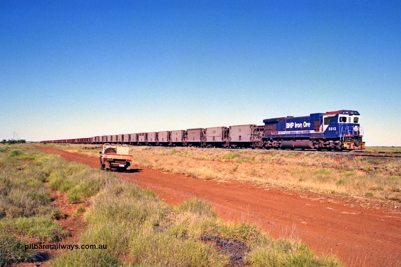 207-25
Hardie Siding, BHP locomotive 5513 is the final member of Goninan rebuilds from ALCo C636 5453 into a GE C36-7M unit 5513 serial 4839-02 / 88-078, with 'Kalgan' nameboards removed for fitting to AC6000 class 6074, holds the main with a loaded Yarrie train awaiting a cross.
Keywords: 5513;Goninan;GE;C36-7M;4839-02/88-078;rebuild;AE-Goodwin;ALCo;C636;5453;G6012-2;