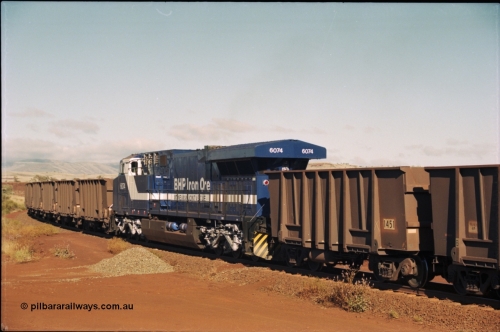 207-06
BHP General Electric built AC6000 unit 6074 serial 51066, brand new and unnamed at Yandi One load-out loop as a remote mid-train unit.
Keywords: 6074;GE;AC6000CW;51066;