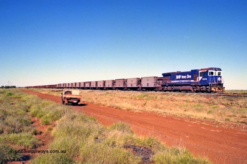 207-25
Hardie Siding, BHP locomotive 5513 is the final member of Goninan rebuilds from ALCo C636 5453 into a GE C36-7M unit 5513 serial 4839-02 / 88-078, with 'Kalgan' nameboards removed for fitting to AC6000 class 6074, holds the main with a loaded Yarrie train awaiting a cross.
Keywords: 5513;Goninan;GE;C36-7M;4839-02/88-078;rebuild;AE-Goodwin;ALCo;C636;5453;G6012-2;