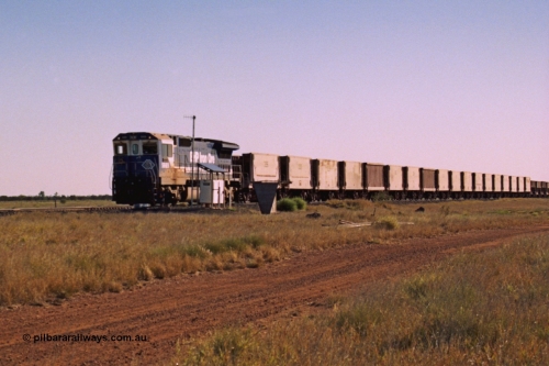207-27
Hardie Siding, BHP unit 5669 'Builen' serial 8412-02 / 95-160 is the highest numbered CM40-8MEFI rebuild by Goninan in the BHP roster, leading an empty train as it takes the passing track to effect a cross.
Keywords: 5669;Goninan;GE;CM40-8EFI;8412-02/95-160;rebuild;Comeng-NSW;ALCo;M636C;5486;C6084-2;