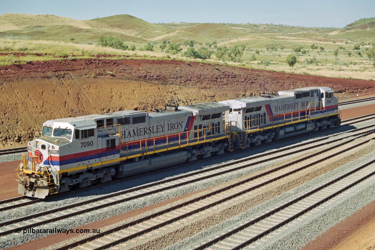 218-31
Yandicoogina or HIY as Hamersley Iron identify it, located 445 km from Parker Point yard in Dampier. Bank engine units General Electric Dash 9-44CW models 7090 serial 47769 and 7089 idle away waiting their next loaded train to push out.
Keywords: 7090;GE;Dash-9-44CW;47769;