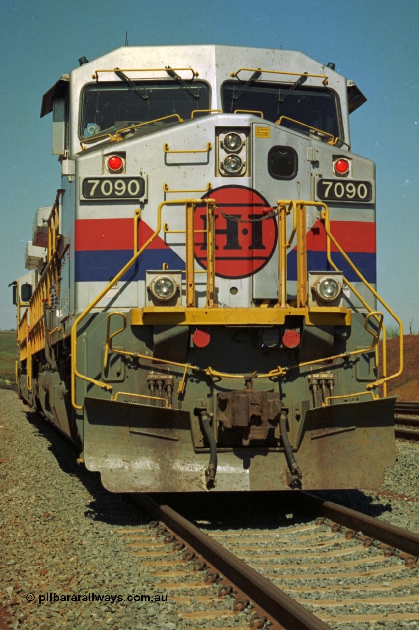 219-06
Yandicoogina or HIY as Hamersley Iron identify it, located 445 km from Parker Point yard in Dampier. Bank engine units General Electric Dash 9-44CW models 7090 serial 47769 and 7089 idle away waiting their next loaded train to push out.
Keywords: 7090;GE;Dash-9-44CW;47769;