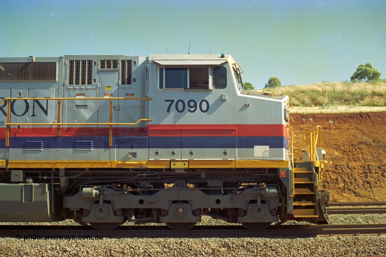 219-07
Yandicoogina or HIY as Hamersley Iron identify it, located 445 km from Parker Point yard in Dampier. Bank engine unit General Electric Dash 9-44CW model 7090 serial 47769 in the delivered 'Pepsi Can' livery. Drivers side cab view.
Keywords: 7090;GE;Dash-9-44CW;47769;