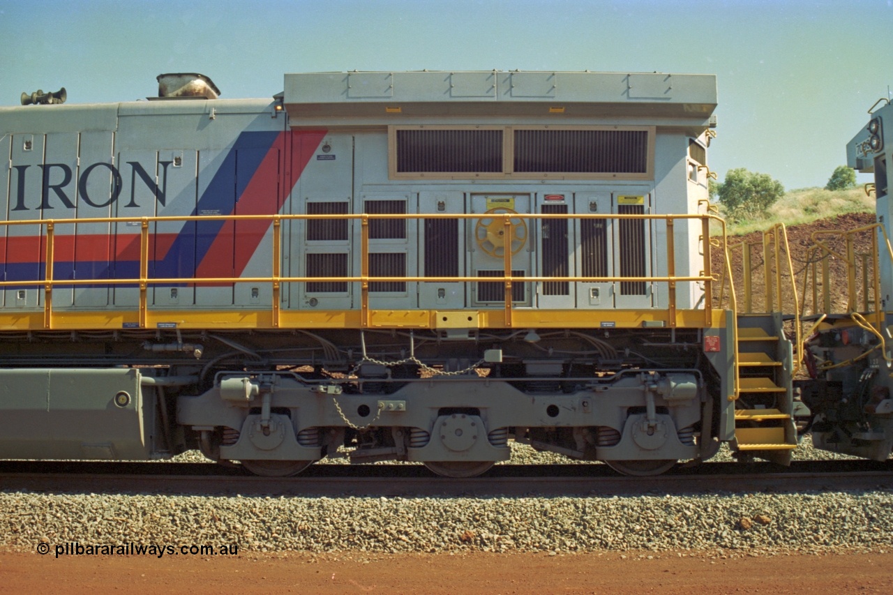 219-10
Yandicoogina or HIY as Hamersley Iron identify it, located 445 km from Parker Point yard in Dampier. Bank engine unit General Electric Dash 9-44CW model 7089 serial 47768 left hand side radiator and bogie view.
Keywords: 7089;GE;Dash-9-44CW;47768;