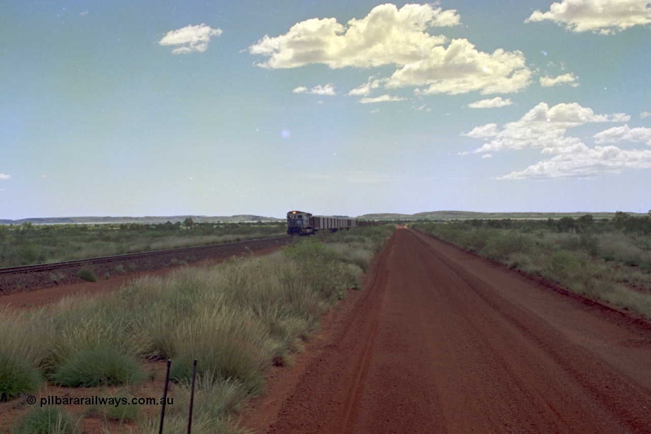 219-19
Goldsworthy Siding, C36-7M unit 5507 'Nimingarra' serial 4839-03 / 87-072, an original Mt Newman Mining ALCo C636 5461 to GE C36-7M rebuild carried out by Goninan, leads an empty train.
Keywords: 5507;Goninan;GE;C36-7M;4839-03/87-072;rebuild;AE-Goodwin;ALCo;C636;5461;G6035-2;