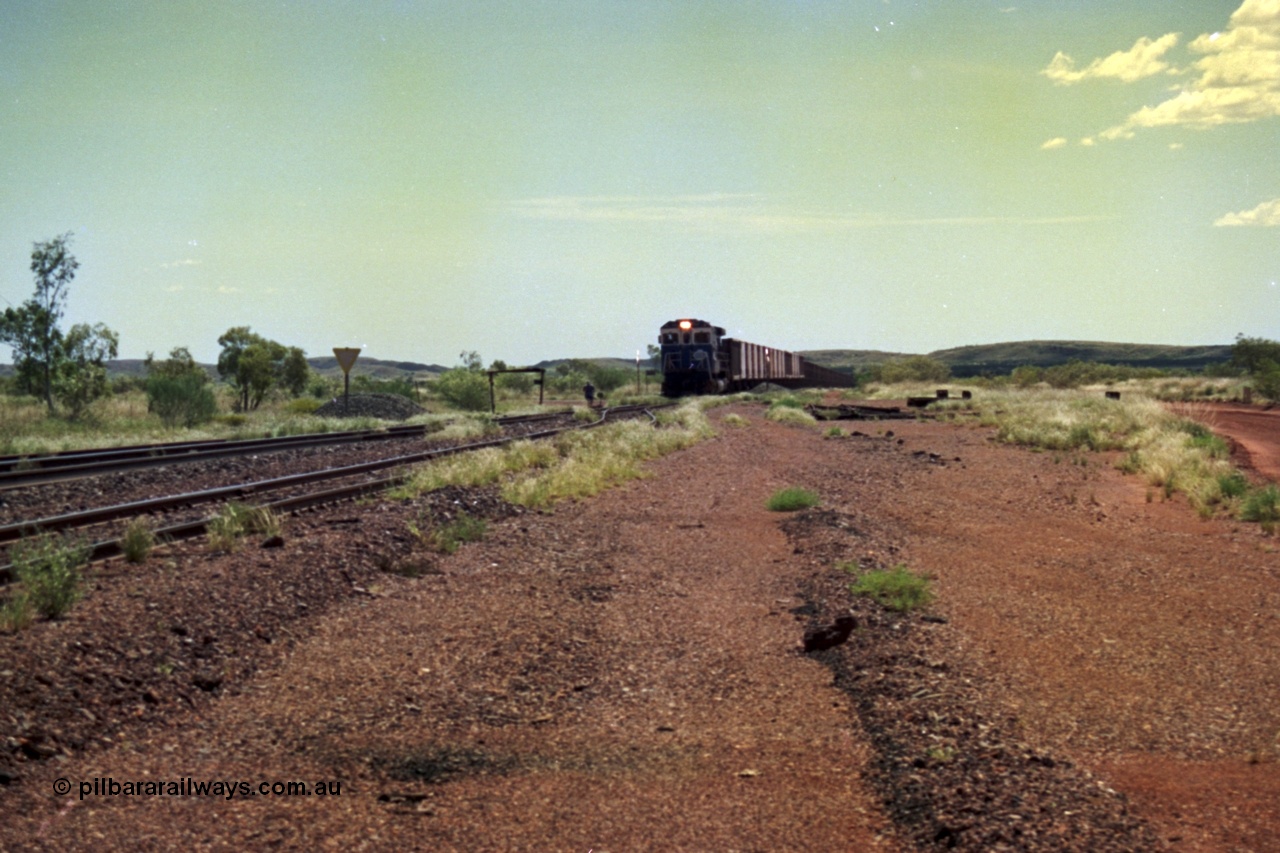 219-23
Goldsworthy Siding, C36-7M unit 5507 'Nimingarra' serial 4839-03 / 87-072, an original Mt Newman Mining ALCo C636 5461 to GE C36-7M rebuild carried out by Goninan, leads an empty train into the siding at Goldsworthy as the second driver sets the road.
Keywords: 5507;Goninan;GE;C36-7M;4839-03/87-072;rebuild;AE-Goodwin;ALCo;C636;5461;G6035-2;