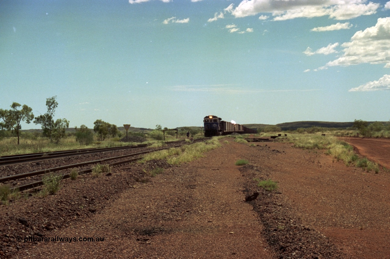 219-24
Goldsworthy Siding, C36-7M unit 5507 'Nimingarra' serial 4839-03 / 87-072, an original Mt Newman Mining ALCo C636 5461 to GE C36-7M rebuild carried out by Goninan, leads an empty train into the siding at Goldsworthy as the second driver sets the road.
Keywords: 5507;Goninan;GE;C36-7M;4839-03/87-072;rebuild;AE-Goodwin;ALCo;C636;5461;G6035-2;