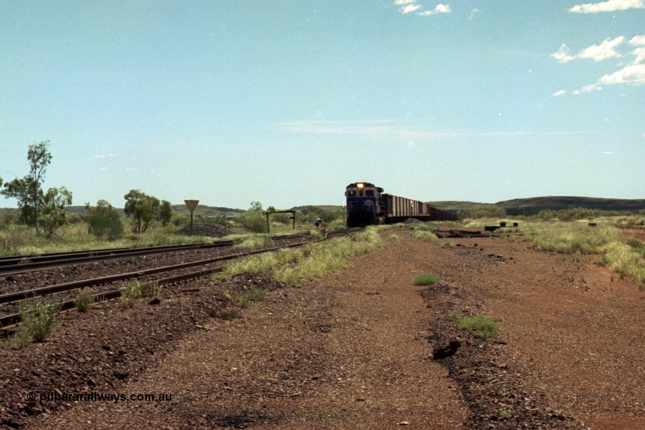 219-25
Goldsworthy Siding, C36-7M unit 5507 'Nimingarra' serial 4839-03 / 87-072, an original Mt Newman Mining ALCo C636 5461 to GE C36-7M rebuild carried out by Goninan, leads an empty train into the siding at Goldsworthy as the second driver sets the road.
Keywords: 5507;Goninan;GE;C36-7M;4839-03/87-072;rebuild;AE-Goodwin;ALCo;C636;5461;G6035-2;