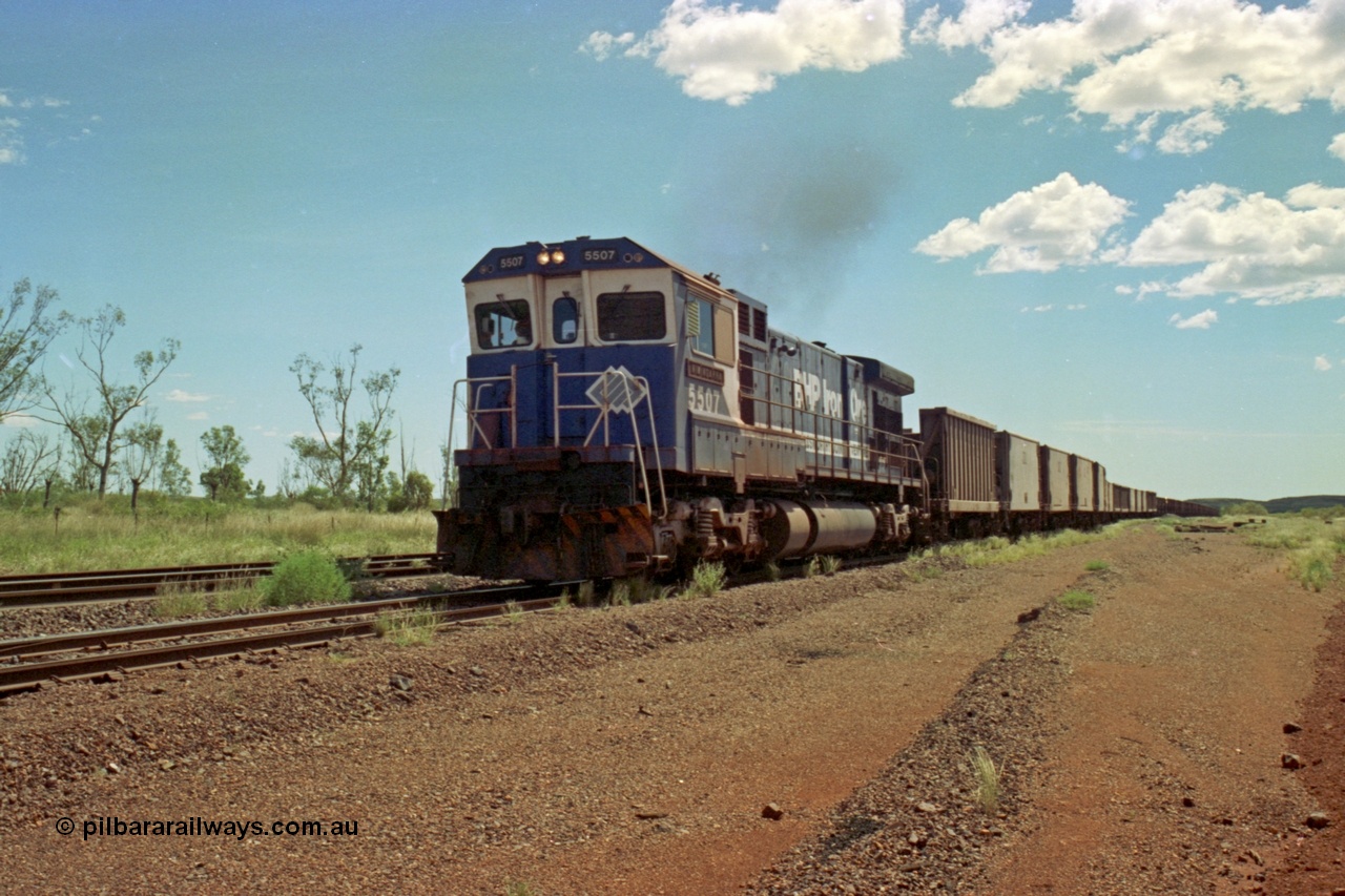 219-28
Goldsworthy Siding, C36-7M unit 5507 'Nimingarra' serial 4839-03 / 87-072, an original Mt Newman Mining ALCo C636 5461 to GE C36-7M rebuild carried out by Goninan, leads an empty train along the siding for a meet.
Keywords: 5507;Goninan;GE;C36-7M;4839-03/87-072;rebuild;AE-Goodwin;ALCo;C636;5461;G6035-2;