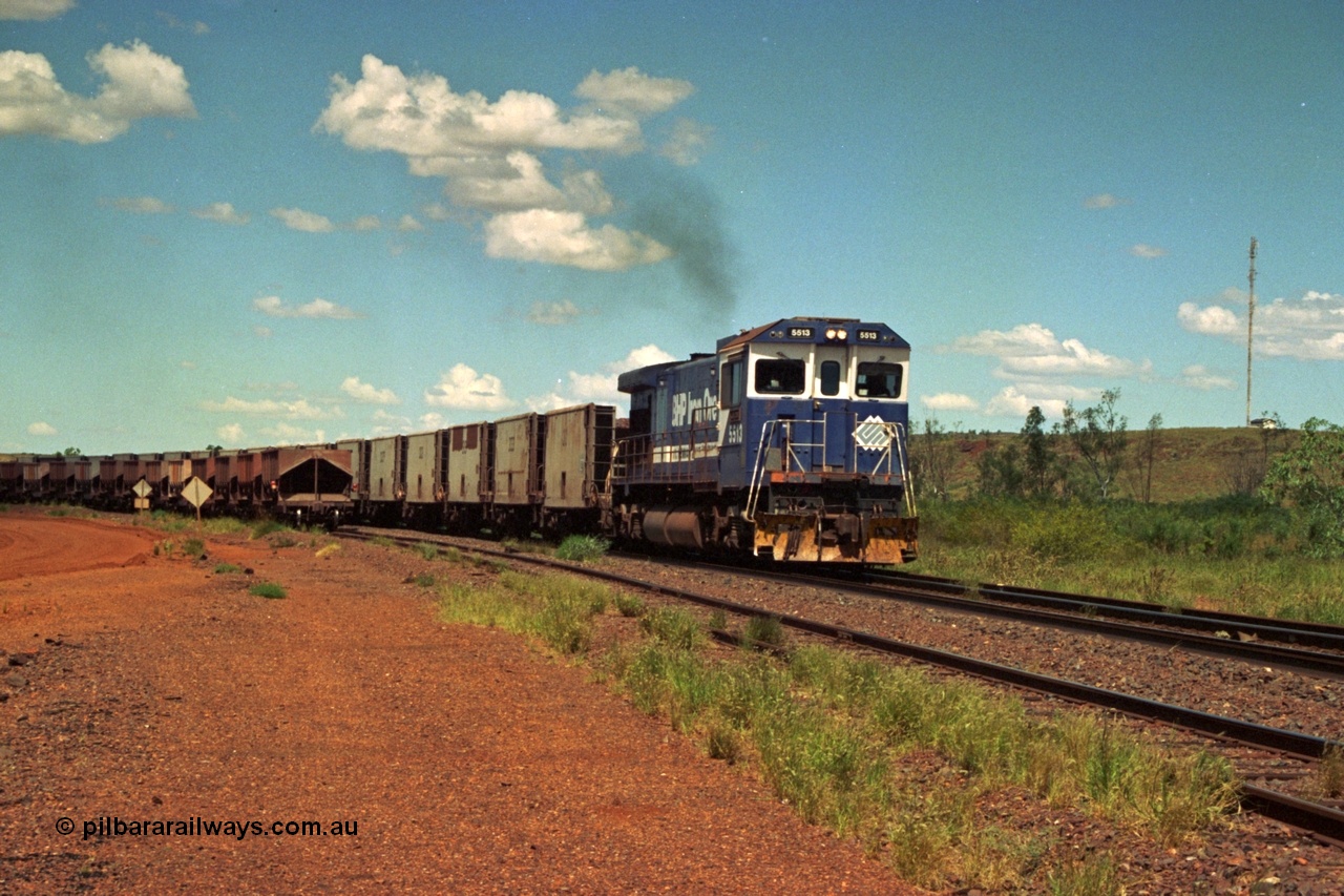 219-33
Goldsworthy Siding, a loaded train powers along the mainline behind BHP C36-7M unit 5513 'Kalgan' serial 4839-02 / 88-078, an original Mt Newman Mining ALCo C636 5453 to GE C36-7M rebuild carried out by Goninan.
Keywords: 5513;Goninan;GE;C36-7M;4839-02/88-078;rebuild;AE-Goodwin;ALCo;C636;5453;G6012-2;