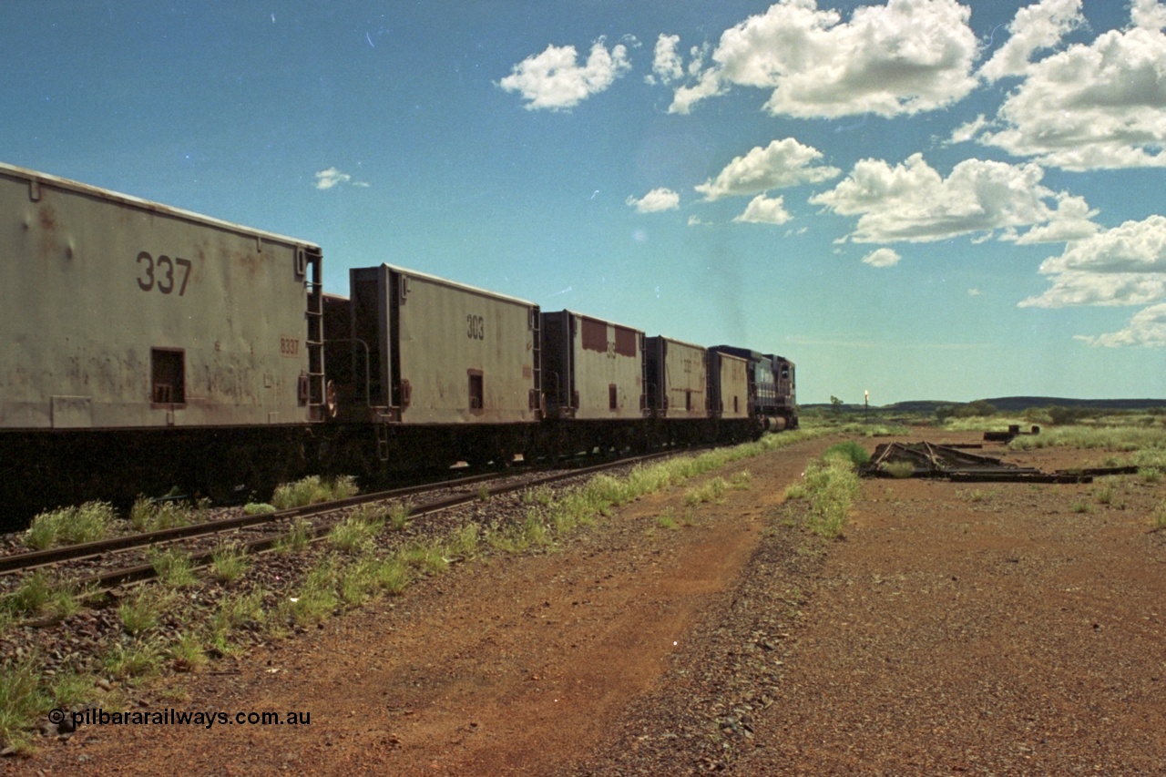 219-35
Goldsworthy Siding, a loaded train powers along the mainline behind BHP C36-7M unit 5513 'Kalgan' serial 4839-02 / 88-078, with some Gunderson USA built smooth sided waggons ex-Phelps Dodge Copper Mine.
Keywords: 303;Gunderson-USA;BHP-ore-waggon;