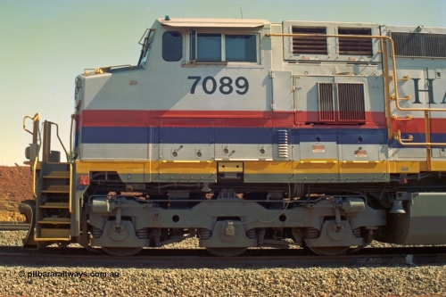 219-11
Yandicoogina or HIY as Hamersley Iron identify it, located 445 km from Parker Point yard in Dampier. Bank engine unit General Electric Dash 9-44CW model 7089 serial 47768 left hand side cab and bogie view.
Keywords: 7089;GE;Dash-9-44CW;47768;