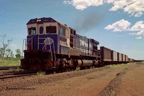 219-29
Goldsworthy Siding, C36-7M unit 5507 'Nimingarra' serial 4839-03 / 87-072, an original Mt Newman Mining ALCo C636 5461 to GE C36-7M rebuild carried out by Goninan, leads an empty train along the siding at Goldsworthy.
Keywords: 5507;Goninan;GE;C36-7M;4839-03/87-072;rebuild;AE-Goodwin;ALCo;C636;5461;G6035-2;