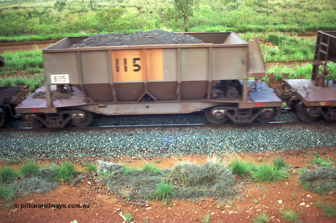 220-19
Tomlinson Steel WA built bottom discharge ore waggon 8115 loaded in the consist of a Yarrie train.
Keywords: 8115;Tomlinson-Steel-WA;BHP-ore-waggon;