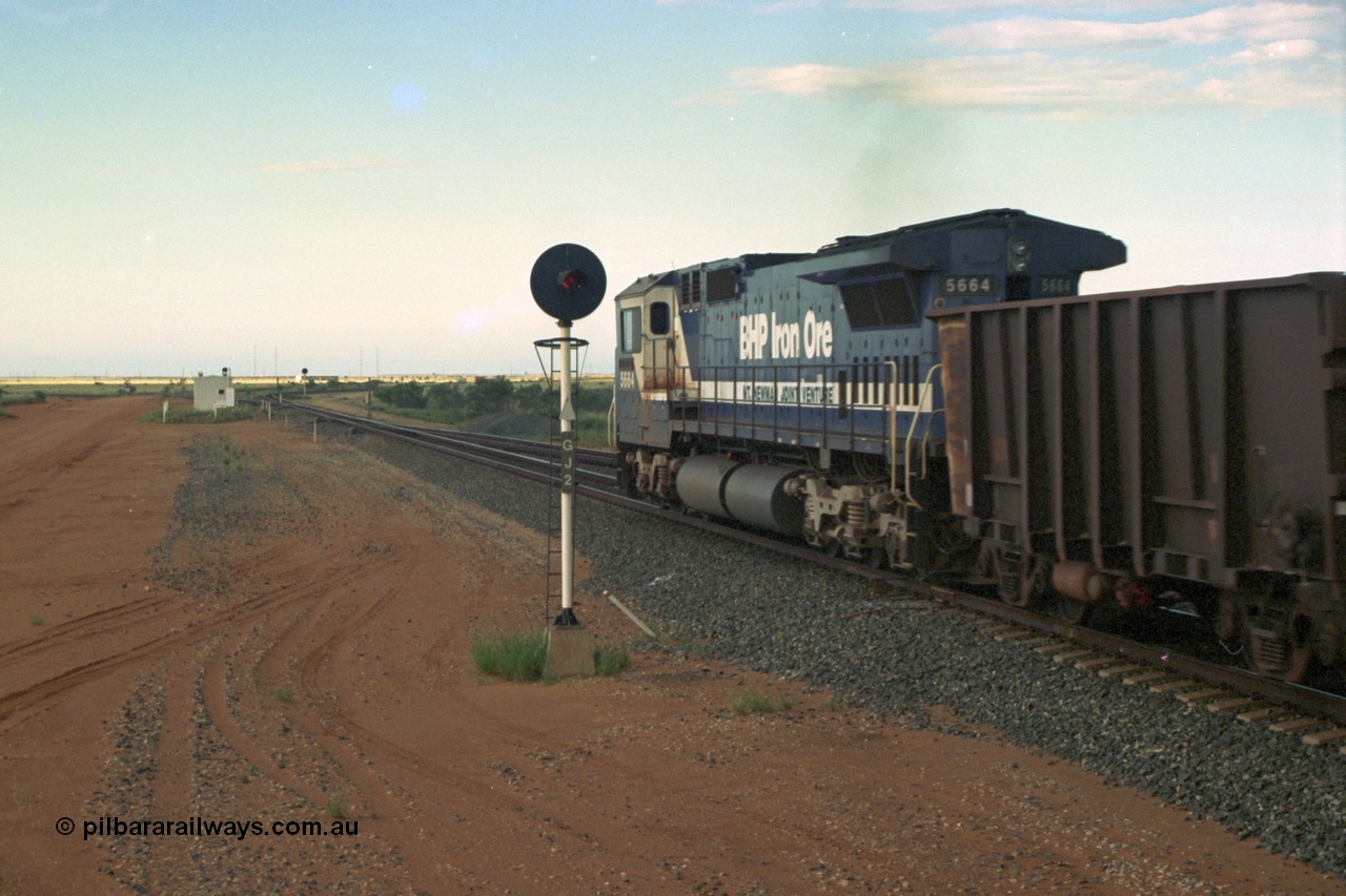 220-35
Goldsworthy Junction, empty train with the trailing loco a Goninan GE rebuild CM40-8ML model 5664 'Kaohsiung' serial 8412-09 / 94-155 was originally rebuilt without a driving cab for use as a LocoTrol II controlling remote, then one was retrofitted following improvements in the size of the required LocoTrol equipment and for operational purposes. Seen here as the trailing remote during a period of trials on Yandi trains where the consist was two leads units, 112 waggons, one loco, 112 waggons and the final loco.
Keywords: 5664;Goninan;GE;CM40-8ML;8412-09/94-155;rebuild;AE-Goodwin;ALCo;M636C;5469;G6047-1;