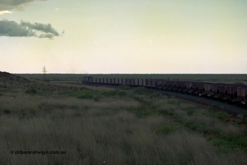 220-18
Just west of the 104.6 km crossing on the Yarrie line, BHP Iron Ore Goninan rebuilt ALCo C636 5431 into a C36-7M unit 5507 serial number 4839-03 / 87-072 seen here leading its loaded train through the curves.
Keywords: 5507;Goninan;GE;C36-7M;4839-03/87-072;rebuild;AE-Goodwin;ALCo;C636;5461;G6035-2;