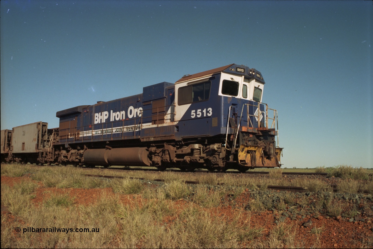 221-02
Hardie Siding, with the days of C36-7M operations numbered, Goninan rebuild 5513 serial 88-078 / 4839-02 from ALCo C636 5453 holds the mainline with a loaded train bound for Finucane Island.
Keywords: 5513;Goninan;GE;C36-7M;4839-02/88-078;rebuild;AE-Goodwin;ALCo;C636;5453;G6012-2;