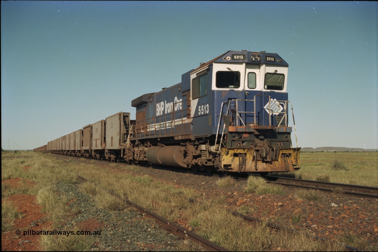 221-04
Hardie Siding, with the days of C36-7M operations numbered, Goninan rebuild 5513 serial 88-078 / 4839-02 from ALCo C636 5453 holds the mainline with a loaded train bound for Finucane Island.
Keywords: 5513;Goninan;GE;C36-7M;4839-02/88-078;rebuild;AE-Goodwin;ALCo;C636;5453;G6012-2;