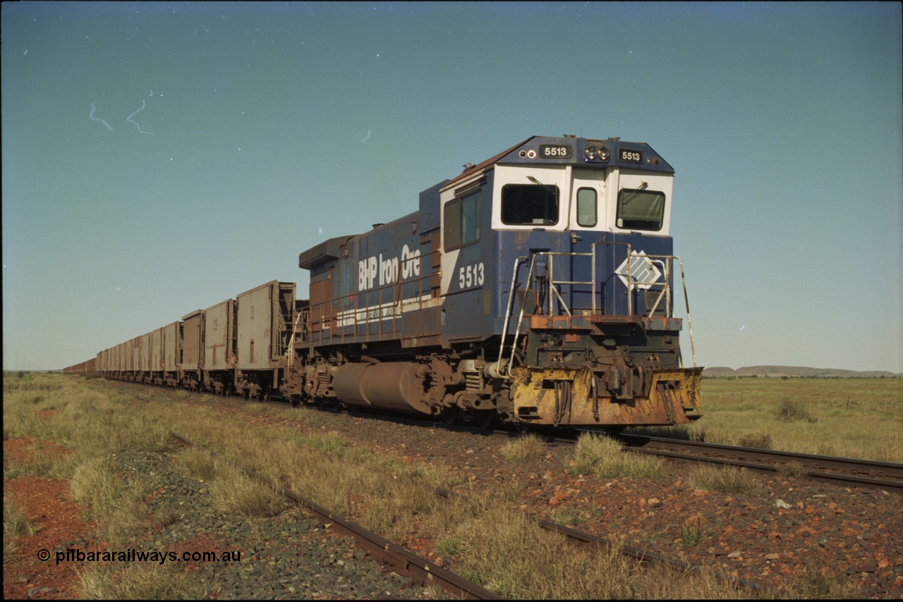 221-05
Hardie Siding, with the days of C36-7M operations numbered, Goninan rebuild 5513 serial 88-078 / 4839-02 from ALCo C636 5453 holds the mainline with a loaded train bound for Finucane Island.
Keywords: 5513;Goninan;GE;C36-7M;4839-02/88-078;rebuild;AE-Goodwin;ALCo;C636;5453;G6012-2;