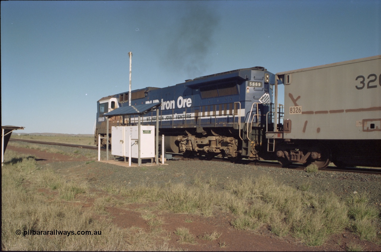 221-17
Hardie Siding, BHP Iron Ore Goninan rebuild unit CM40-8MEFI 5669 the last Dash 8 rebuilt for BHP and one of four fitted with an EFI prime mover, serial 95-160/8412-02, passes the Hardie Station 71 location cases and continues on the mainline bound for loading at Yarrie.
Keywords: 5669;Goninan;GE;CM40-8EFI;8412-02/95-160;rebuild;Comeng-NSW;ALCo;M636C;5486;C6084-2;