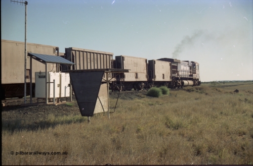 221-10
Hardie Siding, with the days of C36-7M operations numbered, Goninan rebuild 5513 serial 88-078 / 4839-02 from ALCo C636 5453 heads away from Hardie past the location equipment and the train crew shelter with a loaded train bound for Finucane Island.
Keywords: 5513;Goninan;GE;C36-7M;4839-02/88-078;rebuild;AE-Goodwin;ALCo;C636;5453;G6012-2;