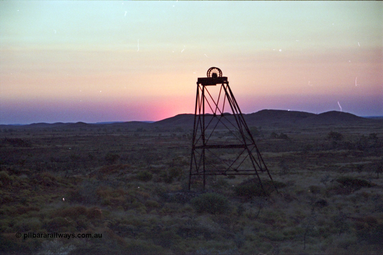 222-15
Lalla Rookh gold mine head frame at sunset.
 In the 1924 WA Mines Department report, it states there was a ten head battery and five cyanide vats for leaching located here [url=https://goo.gl/maps/9rohpzbjgdF2]GeoData[/url].
