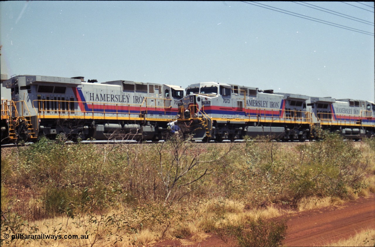 222-26
Somewhere on the original single line section between Gull and Rosella Hamersley Iron 7073 serial 47752 a General Electric Dash 9-44CW built by GE at Erie with 7091 has stopped for a crew change besides a loaded headed up by 7071.
Keywords: 7073;GE;Dash-9-44CW;47752;